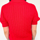 Collared red v neck short sleeve sweater. Knitted look. Regular fit.