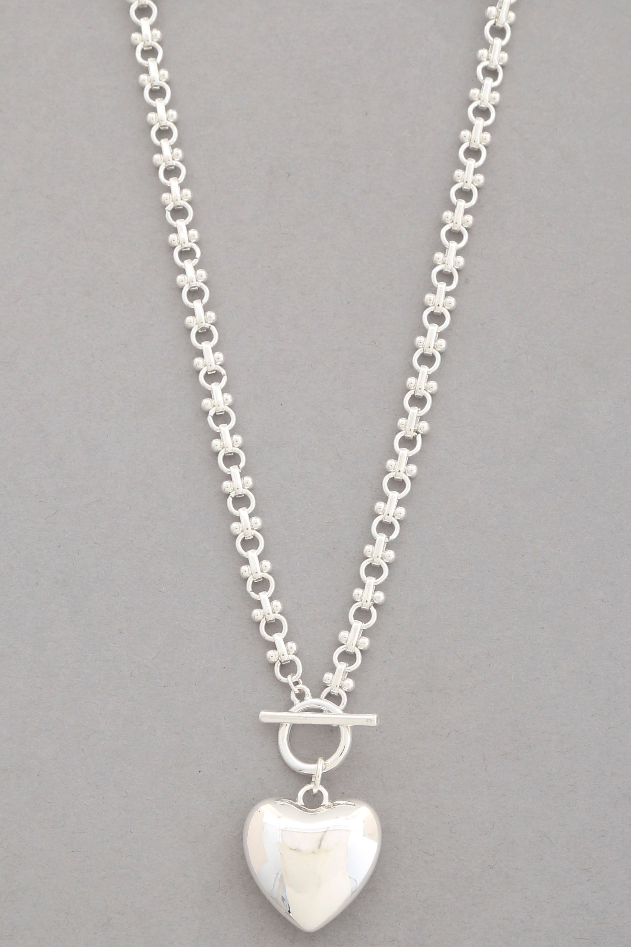 Photo of a silver, toggle clasp, heart pendant necklace