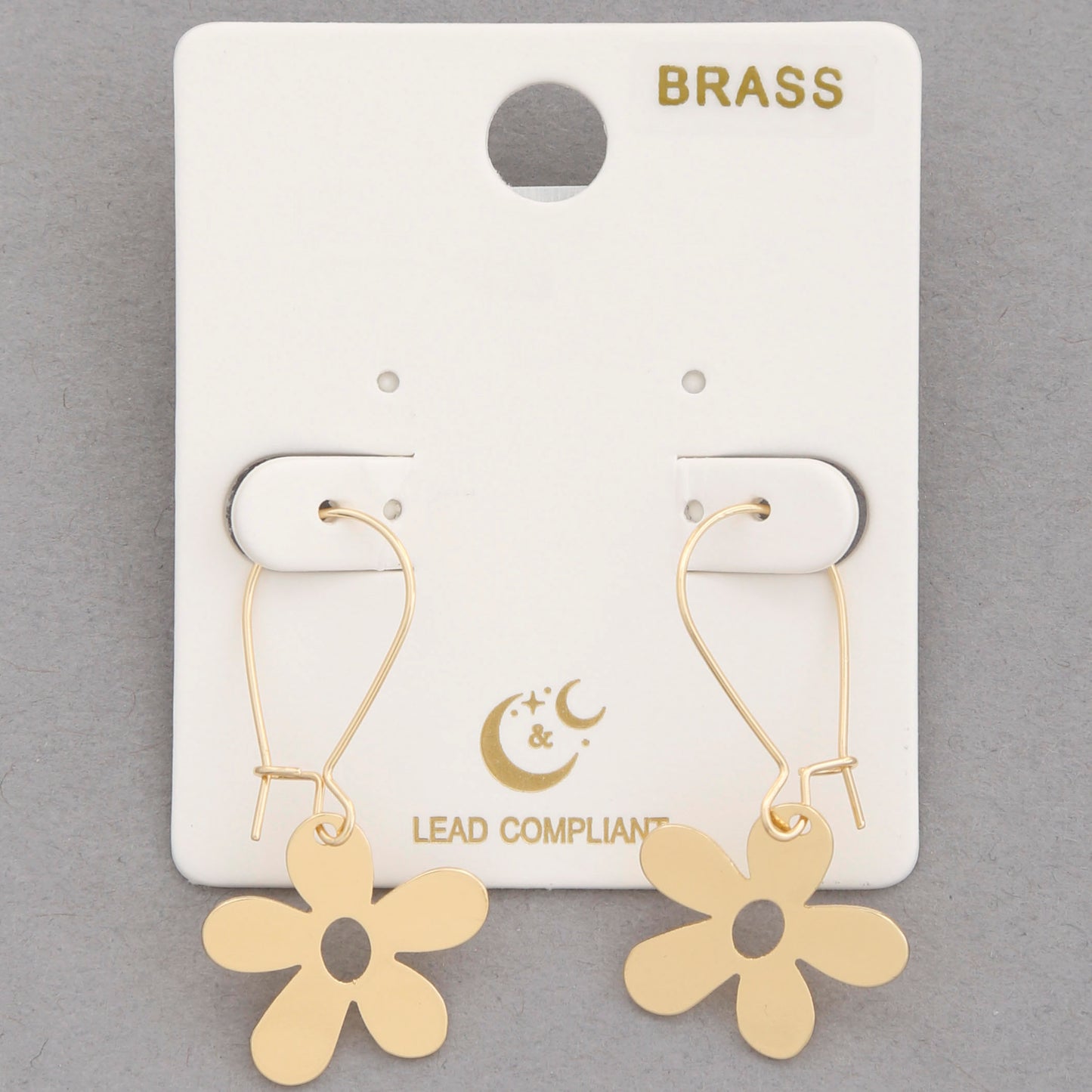 photo of gold daisy shaped earrings 