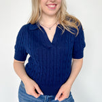 Collared navy v neck short sleeve sweater. Knitted look. Regular fit.