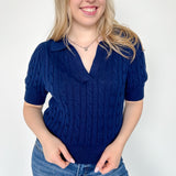 Collared navy v neck short sleeve sweater. Knitted look. Regular fit.
