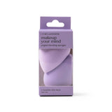 Purple packaging of makeup sponges with text on a white background