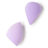 Two purple makeup sponges on a white background