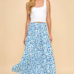 Blue and white floral skirt. Maxi length. Stretchy waistband. Tiered style.