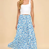 Blue and white floral skirt. Maxi length. Stretchy waistband. Tiered style.