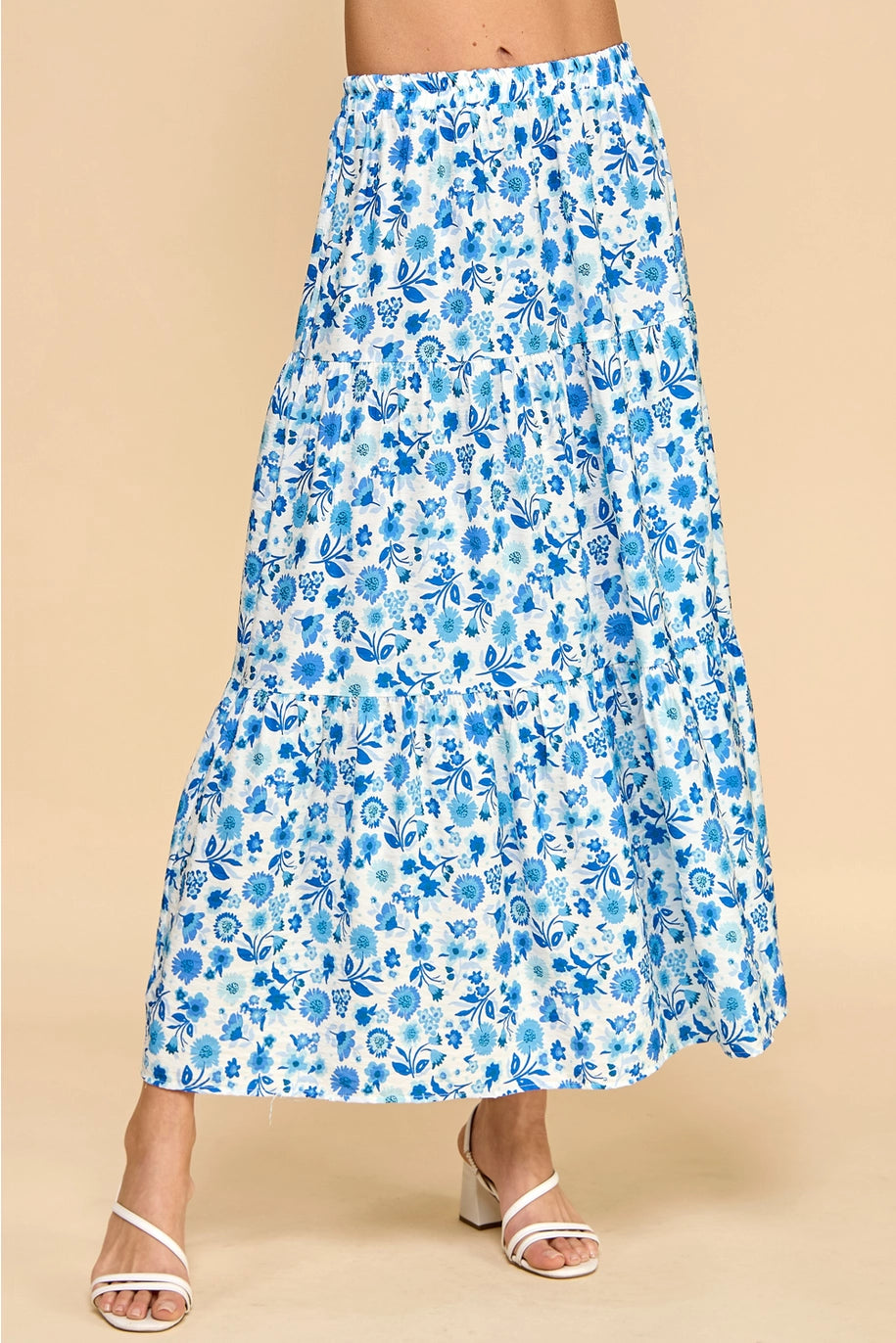 Blue and white floral skirt. Maxi length. Stretchy waistband. Tiered style.
