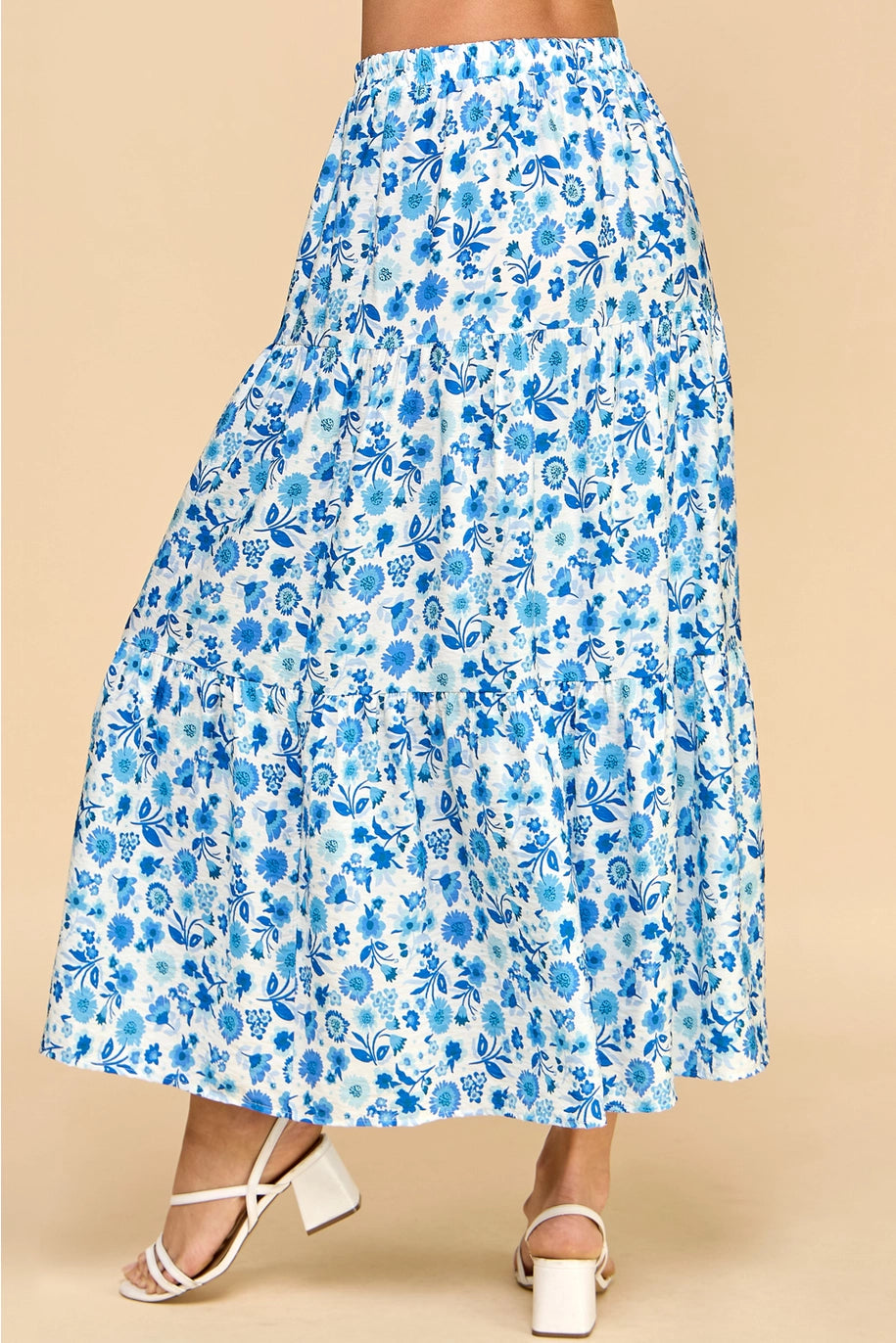 Blue and white floral skirt. Maxi length. Stretchy waistband. Tiered style.