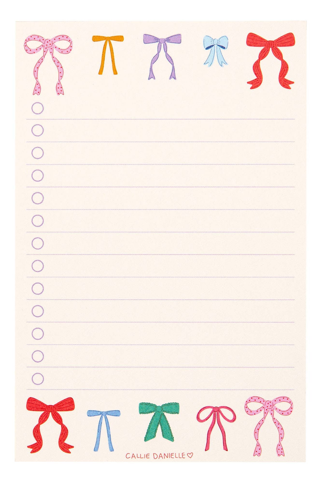 Notepad with colorful bows at the top corner on a white background