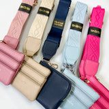 Set of colorful leather wallets with matching straps on a white background