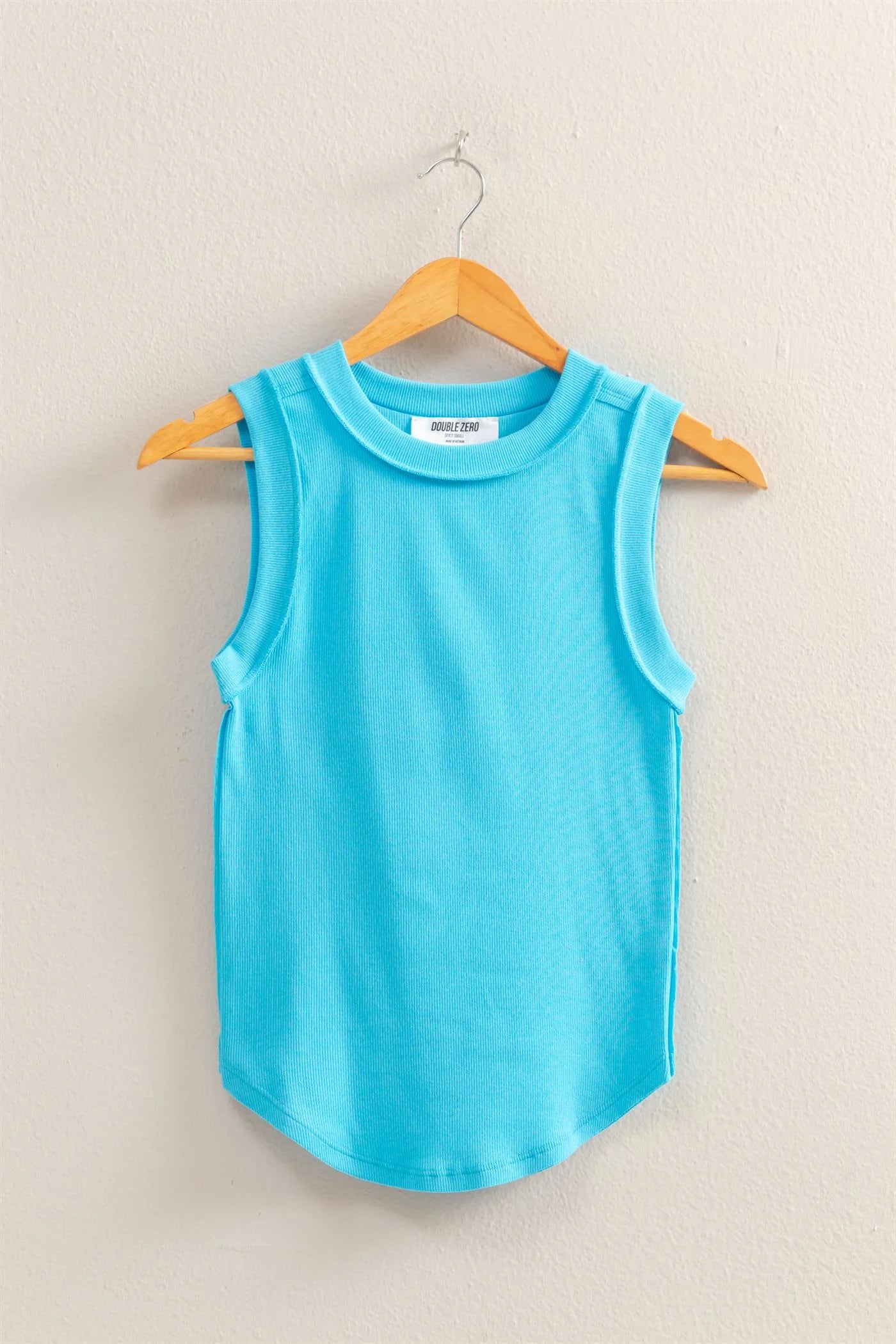 High neckline ribbed tank top. Aqua blue in color. Regular fitting tank. Casual comfortable piece.