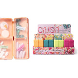 Colorful stationery set with open case and small items on a white background