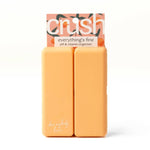 Two orange bars of soap with a 'crush' packaging on a white background
