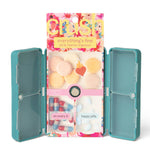 Teal pill organizer with colorful compartments on a white background