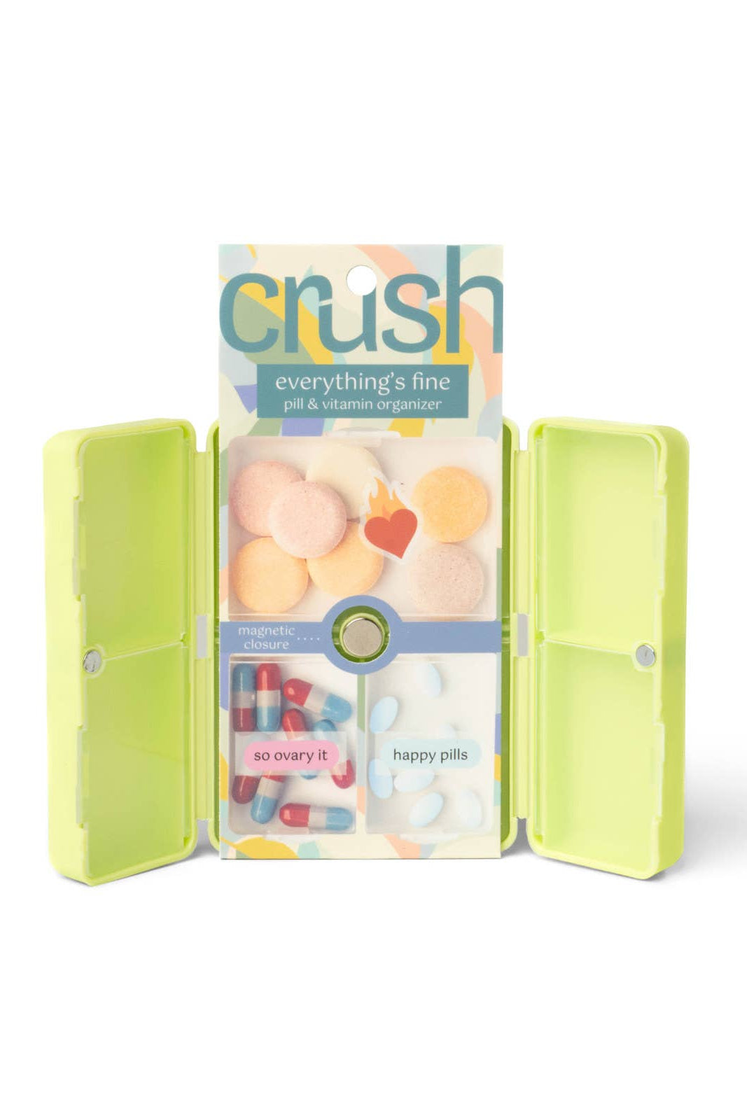 Green pill box with colorful pills and 'crush' packaging on a white background