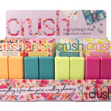 Colorful vitamin organizer with 'crush' branding on a white background