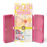 Pink makeup case with a colorful 'Grush' packaging on a white background