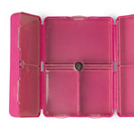 Pink transparent plastic case with compartments on a white background