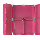 Pink transparent plastic case with compartments on a white background