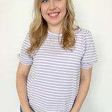 Striped high round neck top. Short sleeve. Regular fit. Slightly puffed sleeves. White and light purple in color.