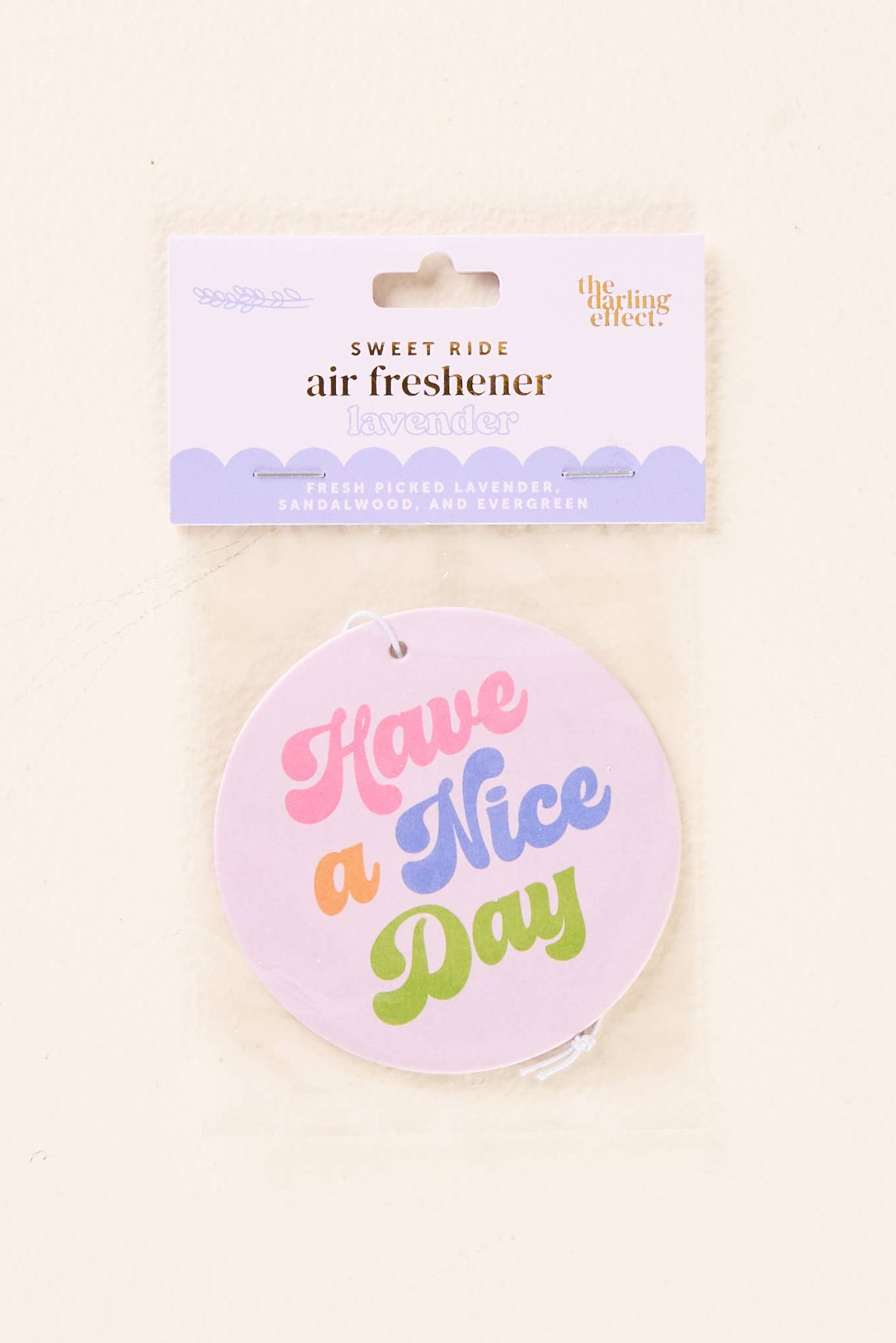 Air freshener with 'Have a Nice Day' text on a white background