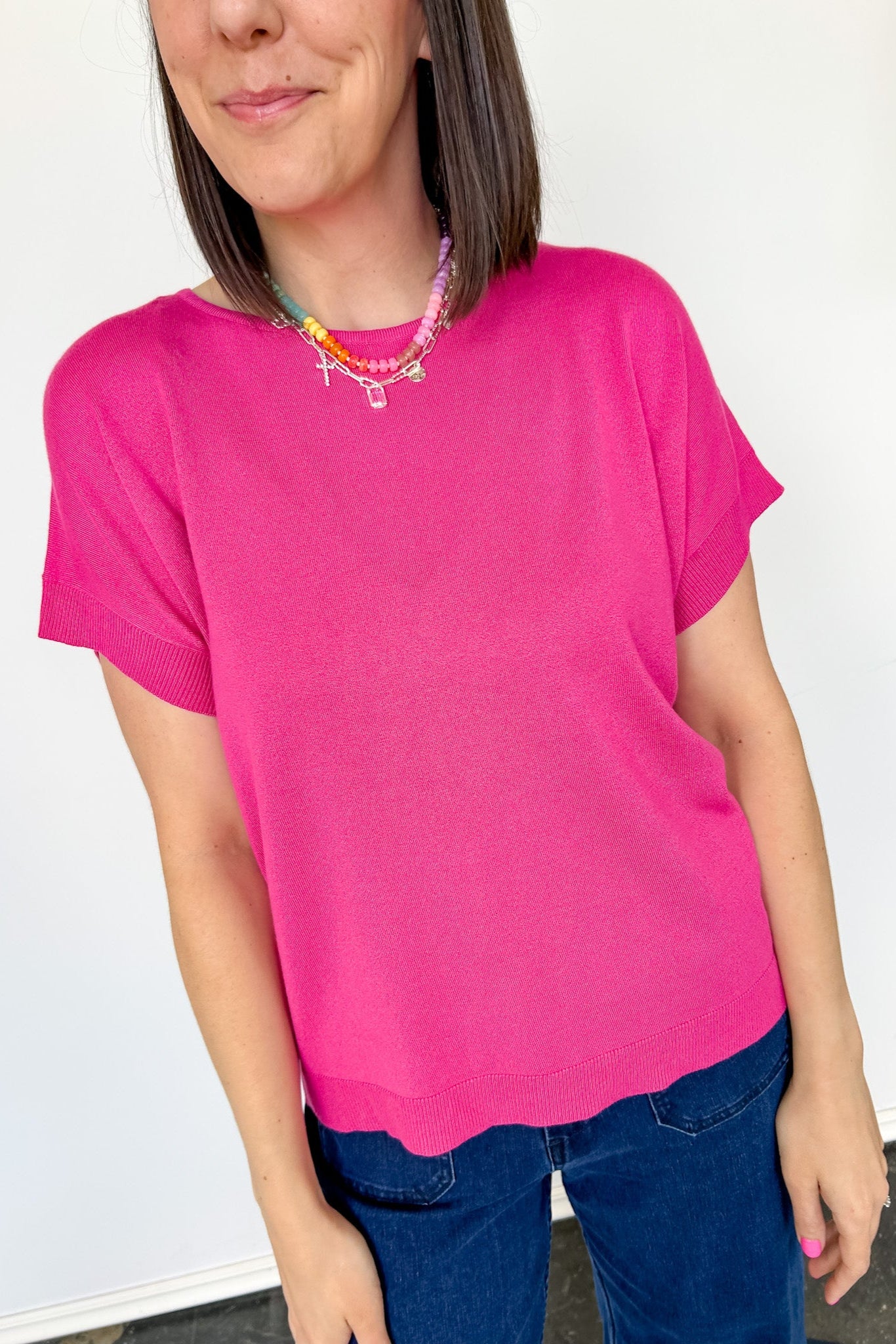 Basic short sleeve top. Slightly oversized fit. High round neckline. Pink in color.