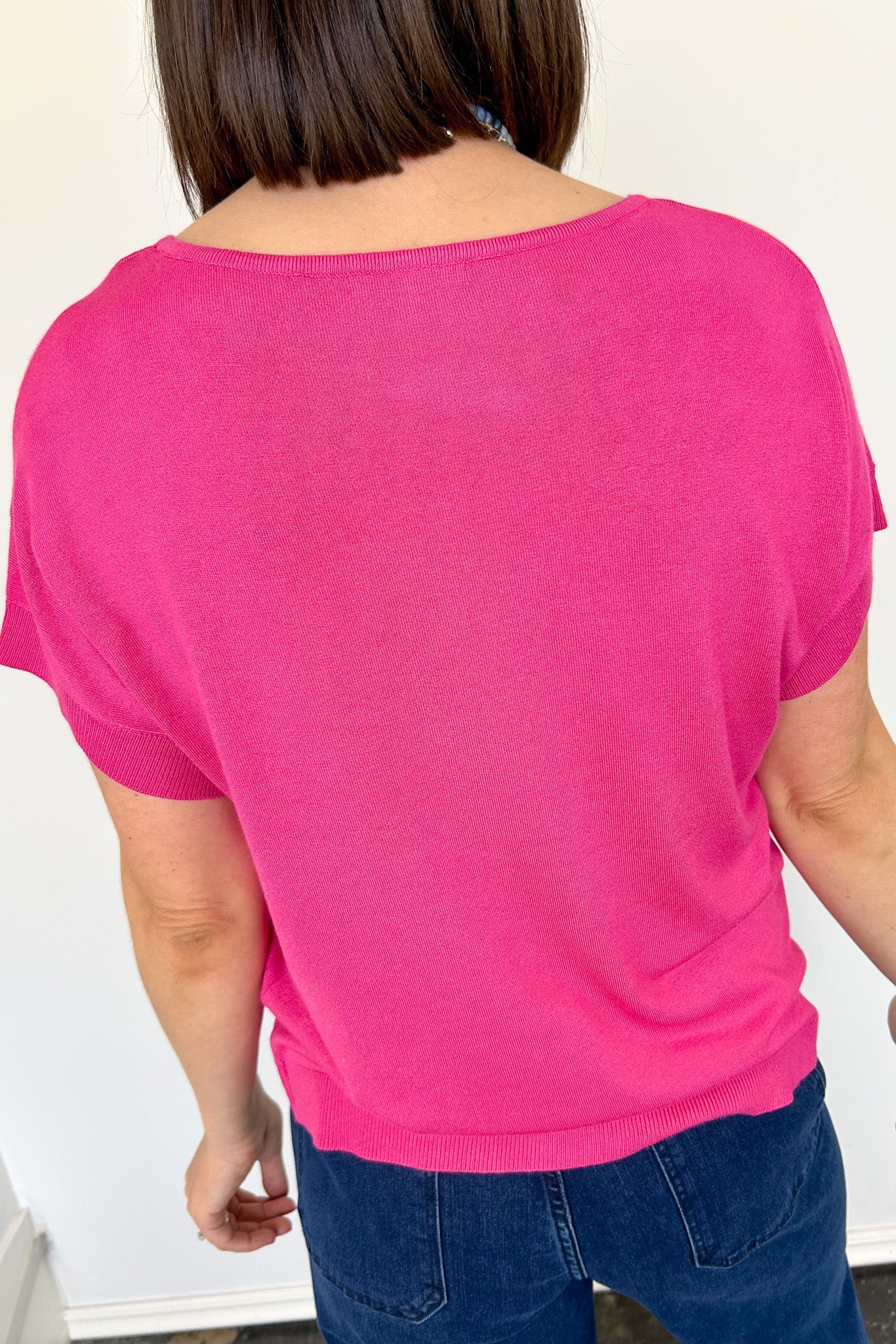 Basic short sleeve top. Slightly oversized fit. High round neckline. Pink in color.