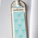 Acrylic bookmark with decorative design on a notebook page