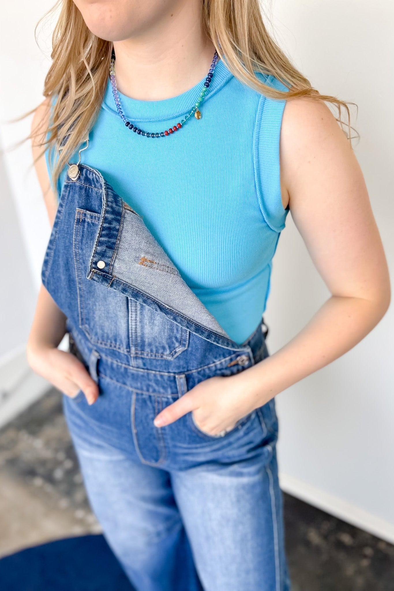 High neck tank top. Fitted style. Perfect for layering and summertime!