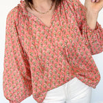 Dandelion print. Salmon in color. V neckline. Blouse style. Oversized fit.