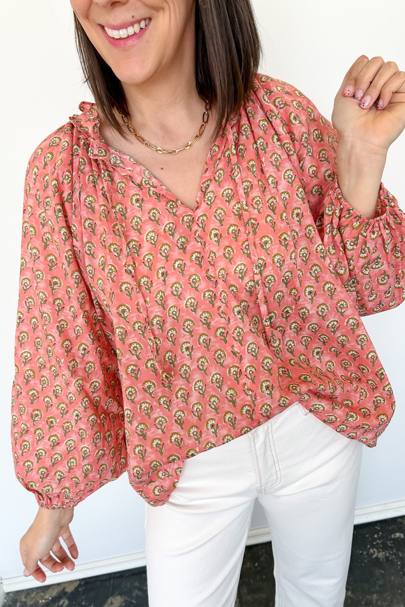 Dandelion print. Salmon in color. V neckline. Blouse style. Oversized fit.