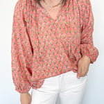 Dandelion print. Salmon in color. V neckline. Blouse style. Oversized fit.