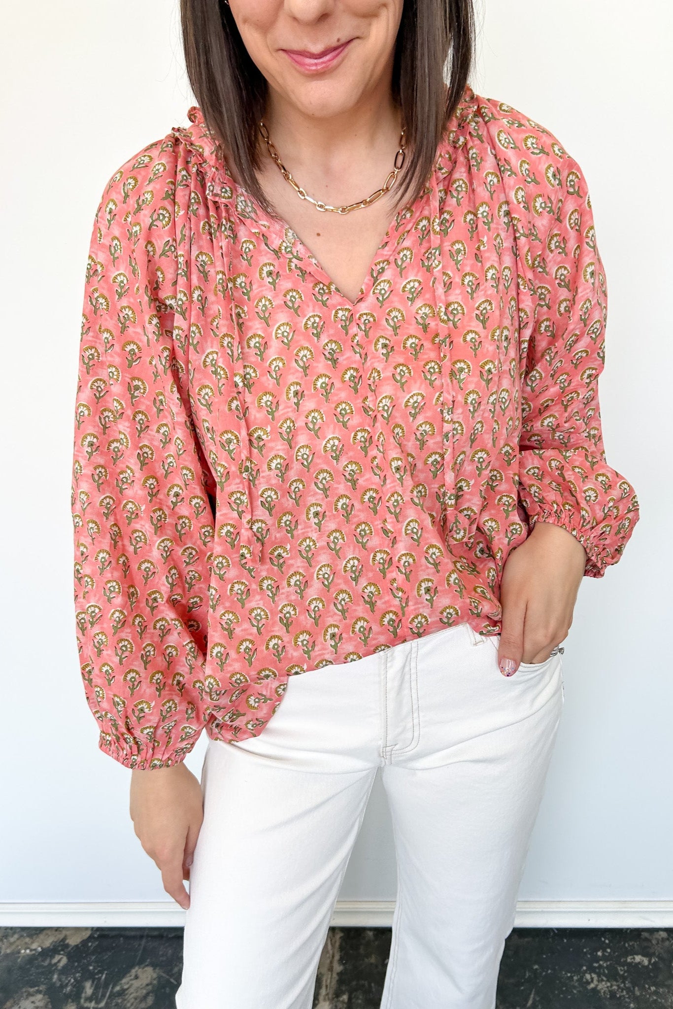 Dandelion print. Salmon in color. V neckline. Blouse style. Oversized fit.