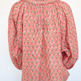 Dandelion print. Salmon in color. V neckline. Blouse style. Oversized fit.