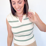 Sweater tank with collar and small v neckline. Cream with olive horizontal stripes. Regular fit. 