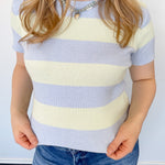 Blue and cream striped sweater top. High neckline. Slightly cropped style.