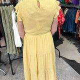 Smocked top dress with short sleeves. Ruffle sleeves. Midi length with tiers. 