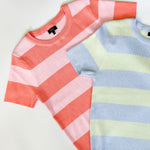 Pink and coral toned striped sweater. High neckline. Slightly cropped fit. Short sleeve style.