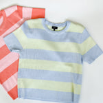 Blue and cream striped sweater top. High neckline. Slightly cropped style.