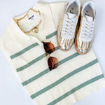 Sweater tank with collar and small v neckline. Cream with olive horizontal stripes. Regular fit. 