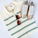 Sweater tank with collar and small v neckline. Cream with olive horizontal stripes. Regular fit. 