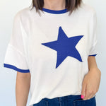 Ringer tee with a royal blue round neckline and a royal blue star. Slightly oversized fit. 
