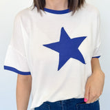 Ringer tee with a royal blue round neckline and a royal blue star. Slightly oversized fit. 