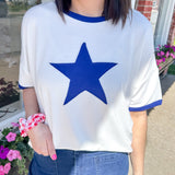 Ringer tee with a royal blue round neckline and a royal blue star. Slightly oversized fit. 