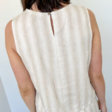 Striped tank and matching pants set. High neckline on top and regular fitting pants. Elastic waistline with tie.  White and tan in color.