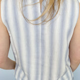 Striped tank and matching pants set. High neckline on top and regular fitting pants. Elastic waistline with tie.  White and blue in color.