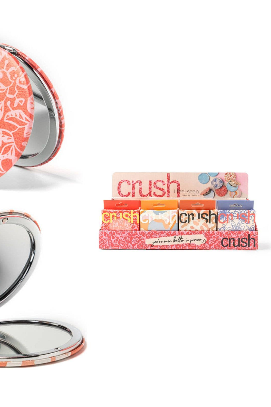 Compact mirror with floral design and 'crush' lip balm packaging on a white background