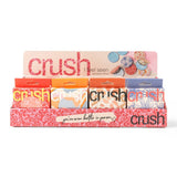 Display of Crush products with colorful packaging on a white background