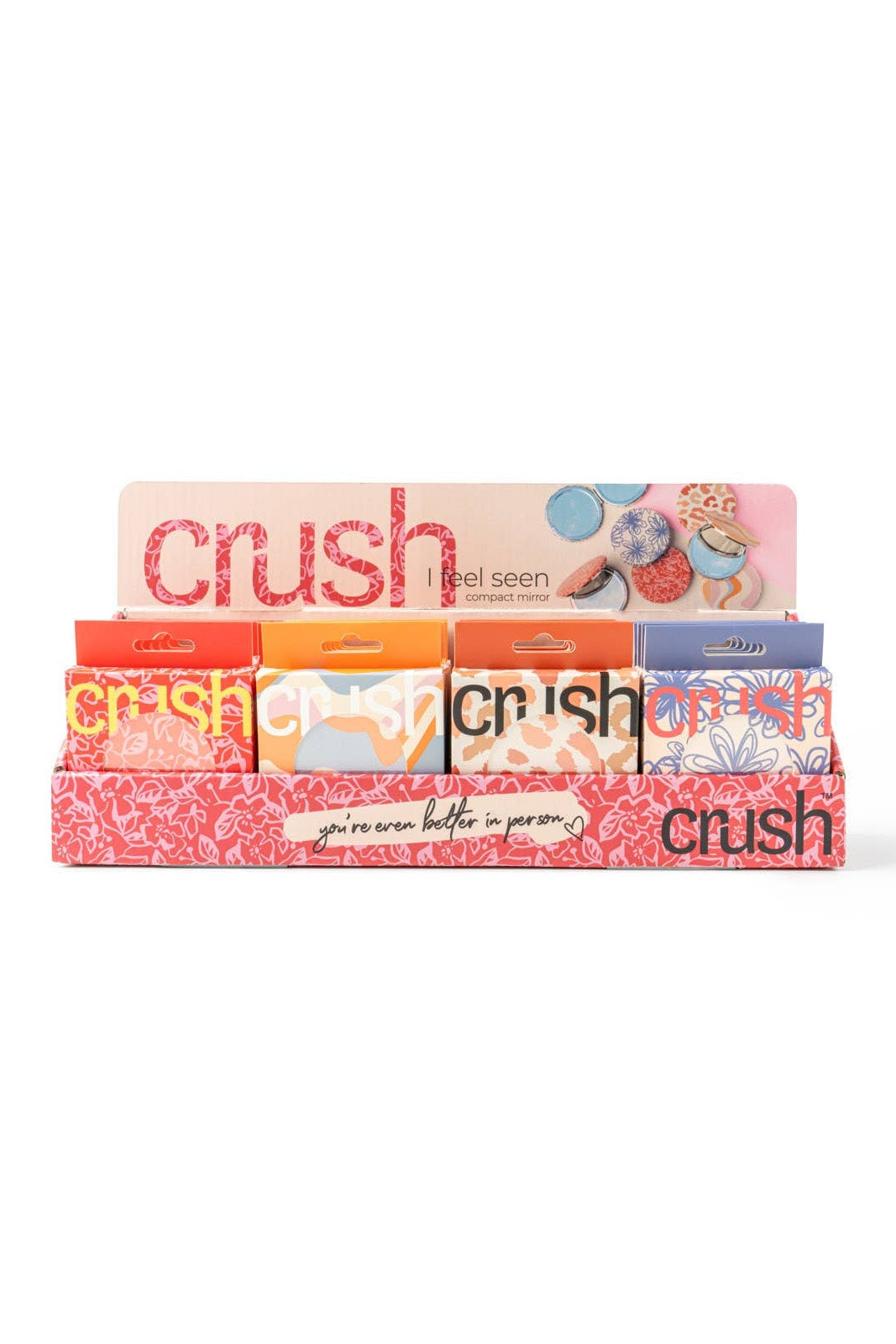 Display of Crush products with colorful packaging on a white background