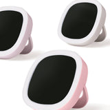 Three black circular devices with pink and white frames on a white background
