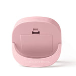 Pink electronic device on a white background